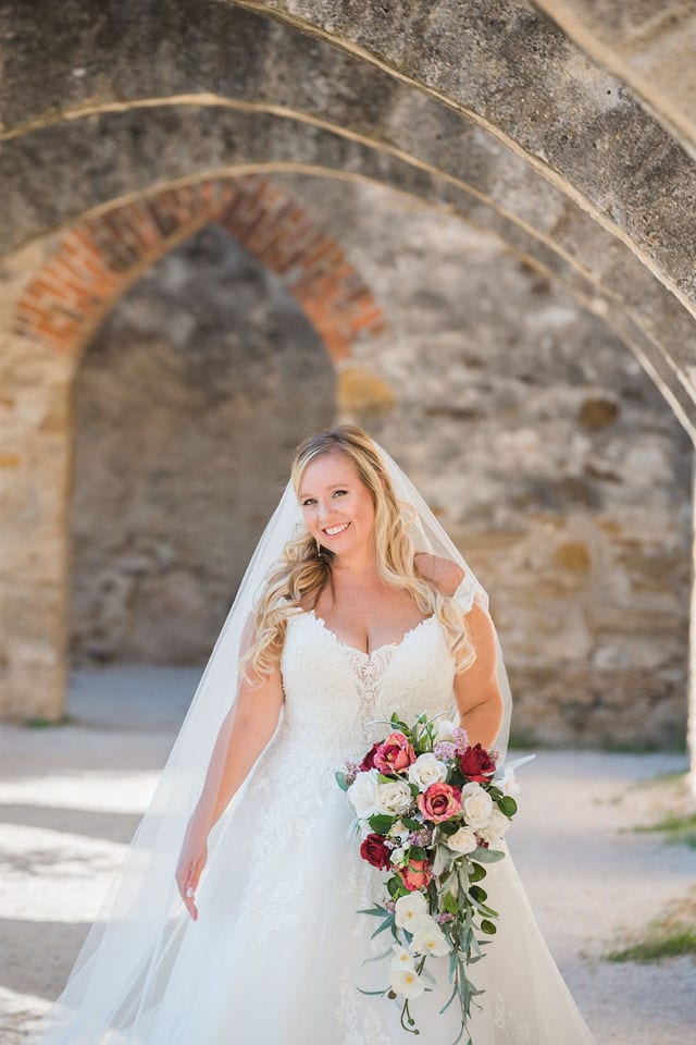 bridal session at Mission San Jose in the arches with the bouquet