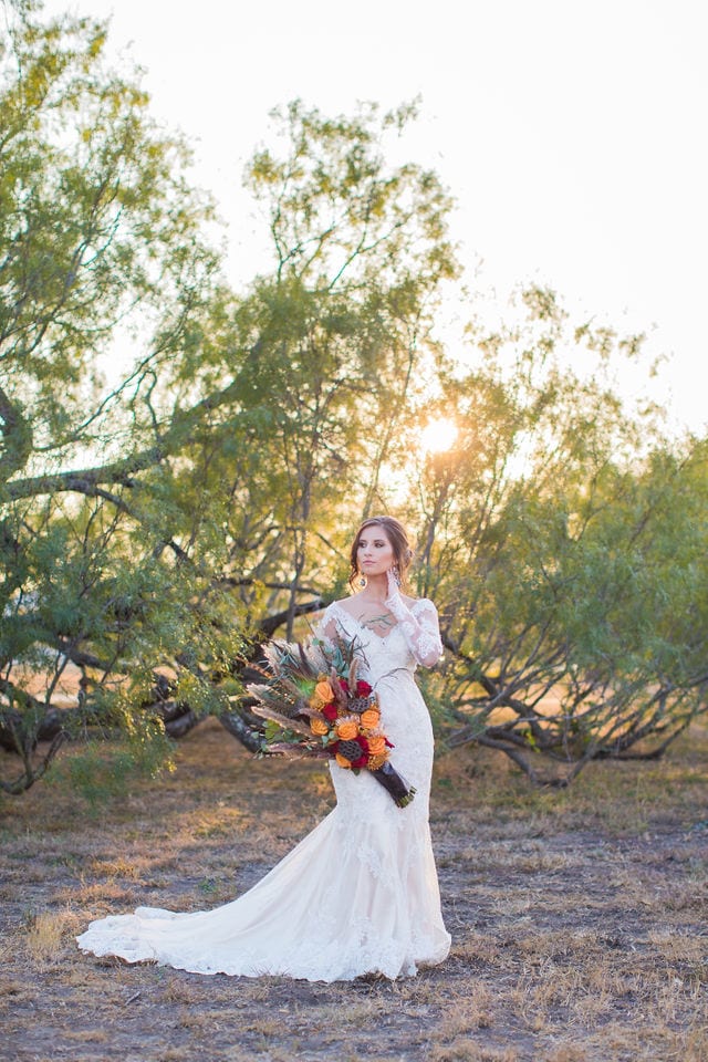 Baleigh Bridal Mission San Jose, San Antonio in front of tree walking