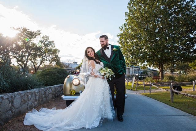 Bride and Groom portrait with Rolls Royce at Canyon Springs wedding