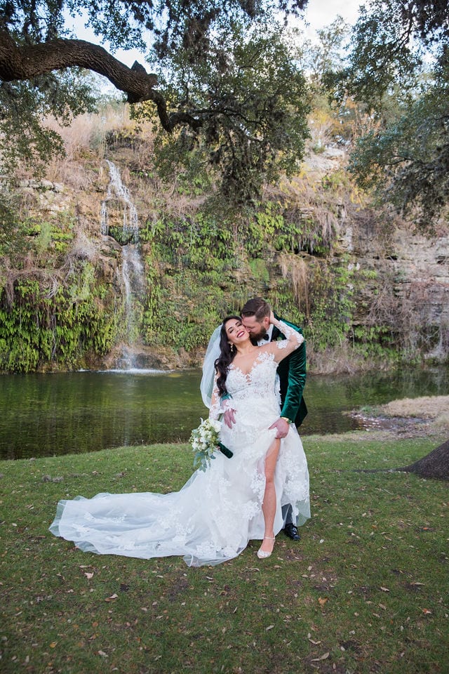 Sexy couple at Canyon Springs by the waterfall wedding