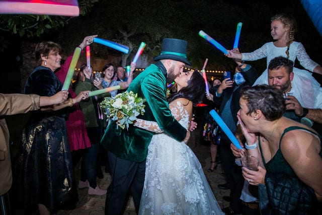 Richards wedding exit kiss at Canyon Springs reception