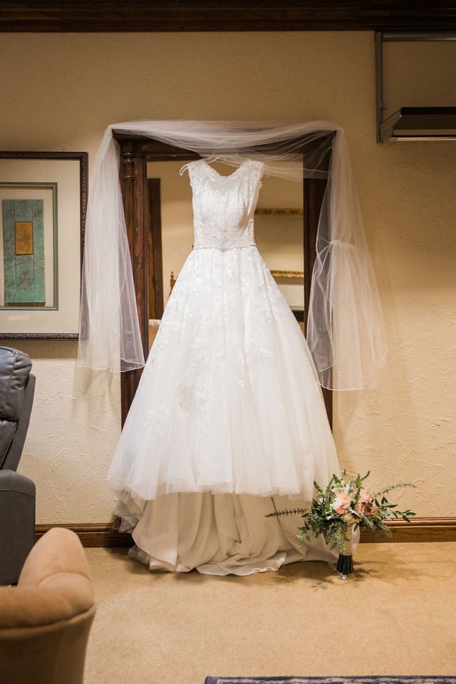 San Antonio wedding, dress hanging up on mirior
