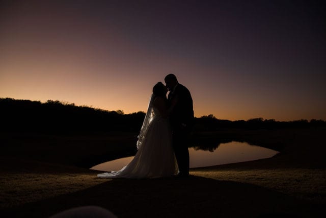 Olympia Hills San Antonio Wedding couple portrait at sunset silhouette