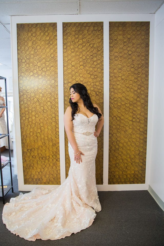 Bridal gown at I do the dress I Do with all the gown wall