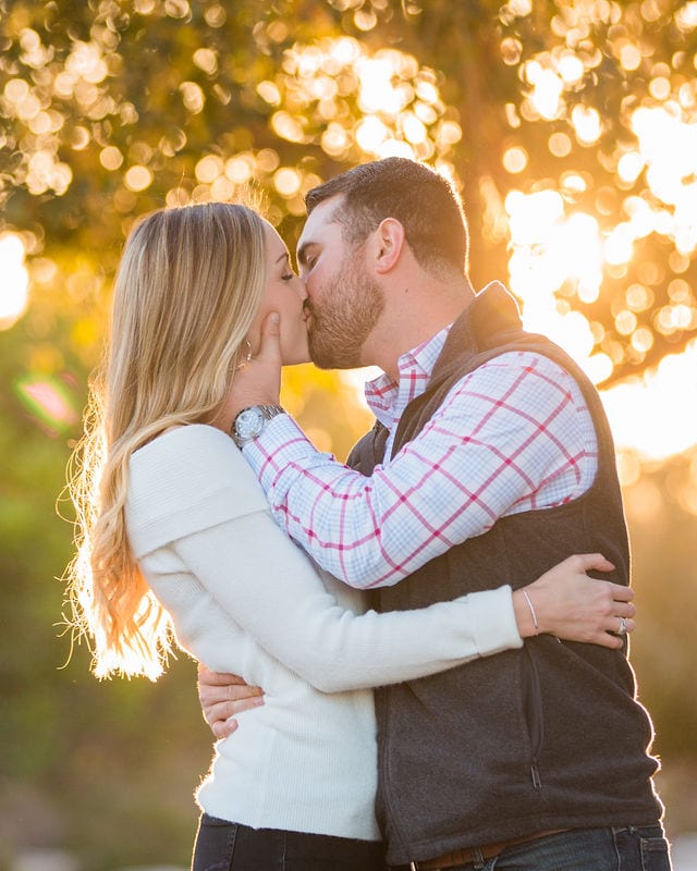 Engagement photography at JW Marriott kiss in the sunset.
