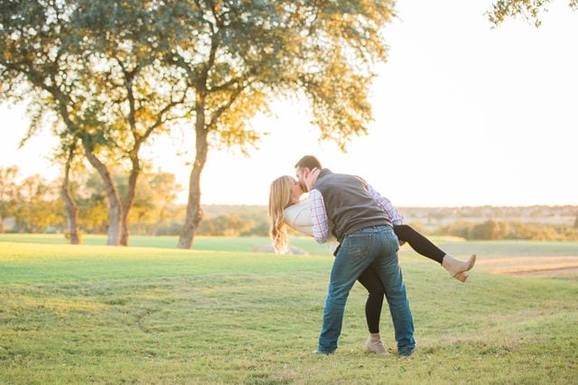 Engagement photography at JW Marriott kiss dip on the green
