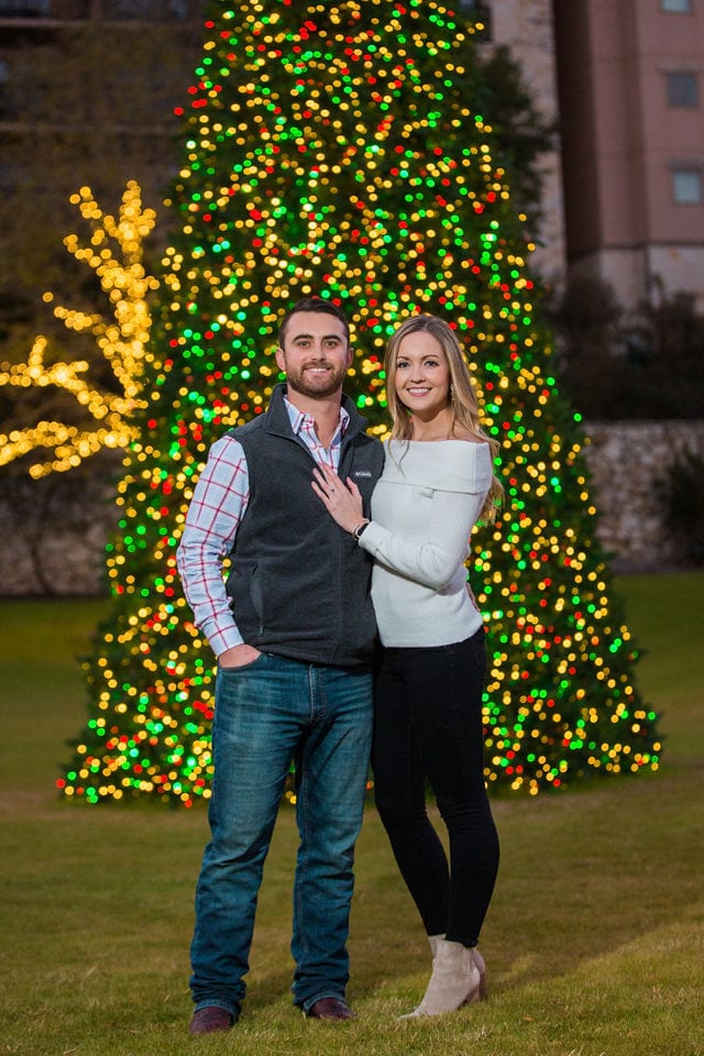 Engagement photography at JW Marriott couple portrait by Christmas tree