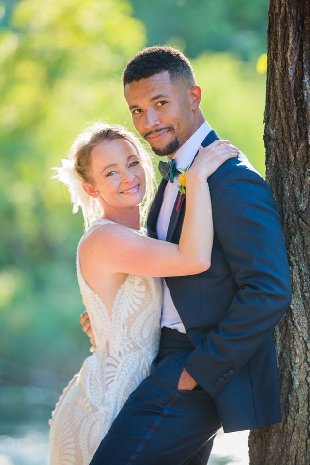Couple portrait by the river at Milltown New Braunfels Wedding