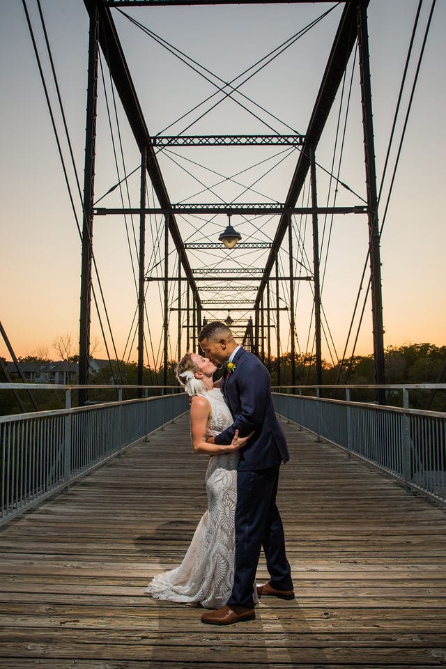 Couple sunset portrait on the bridge at Milltown New Braunfels Wedding