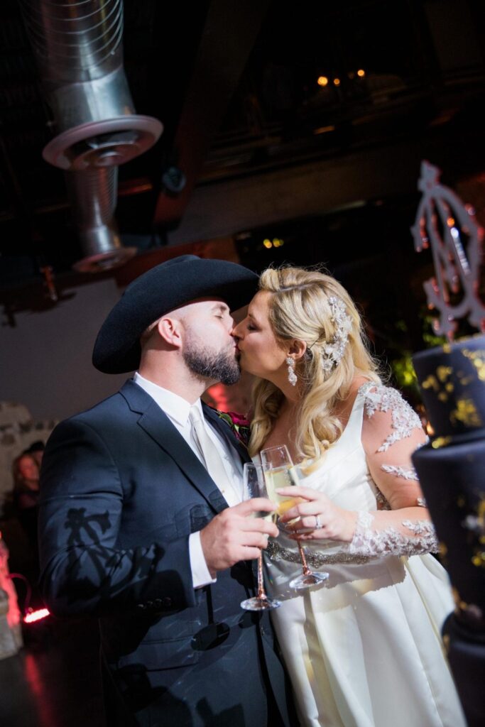 Podraza wedding at park 31 champagne toast kiss