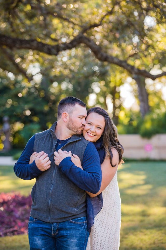 McLerran couple kiss at San Antonio Botanical Gardens