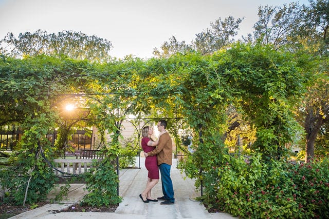 Weber couple at San Antonio Botanical Gardens in gazebo sunlight