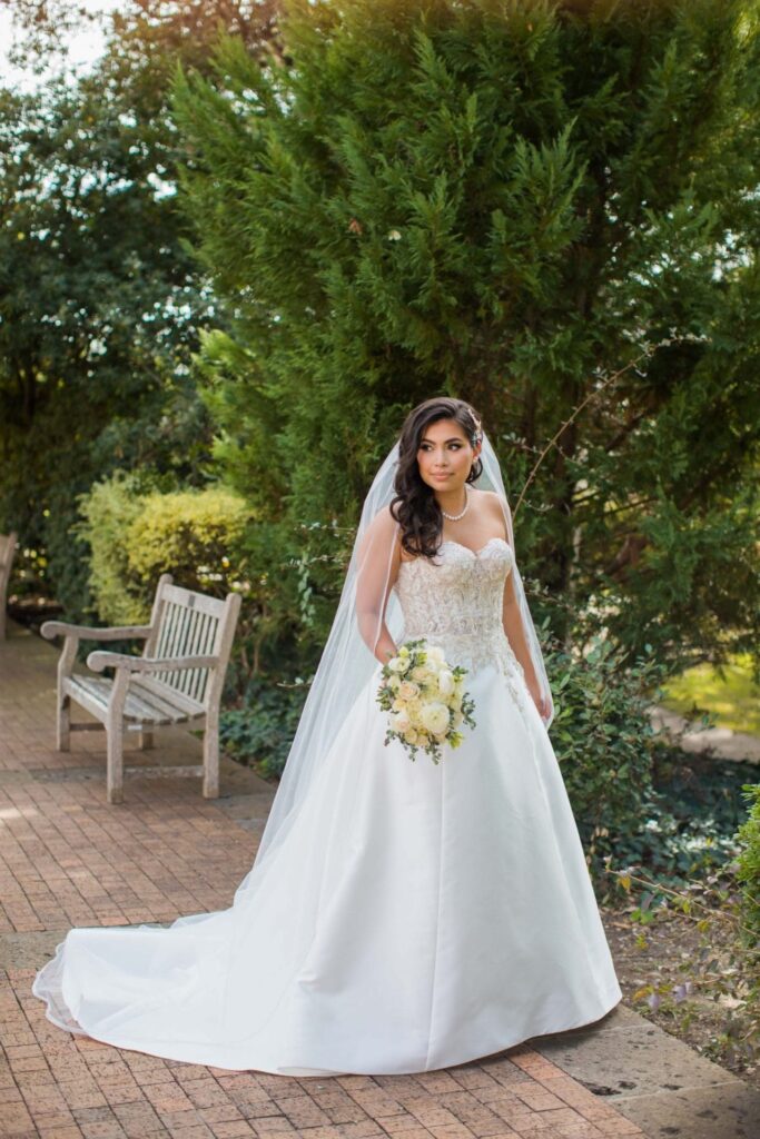 Bridal portrait in garden, Camille at McNay Art Museum