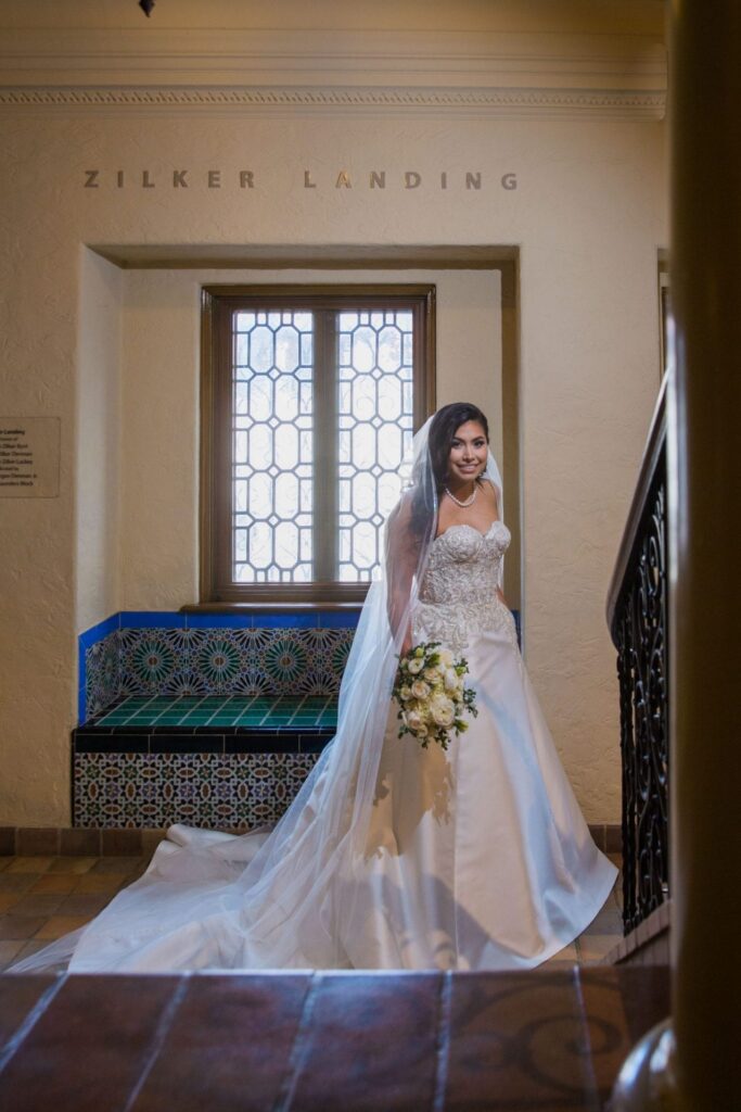Bridal portrait at the window seat, Camille at McNay Art Museum