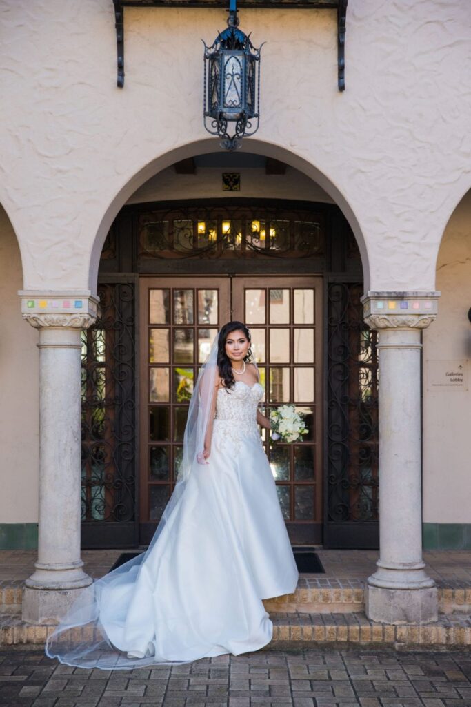 Bridal portrait courtyard arches, Camille at McNay Art Museum