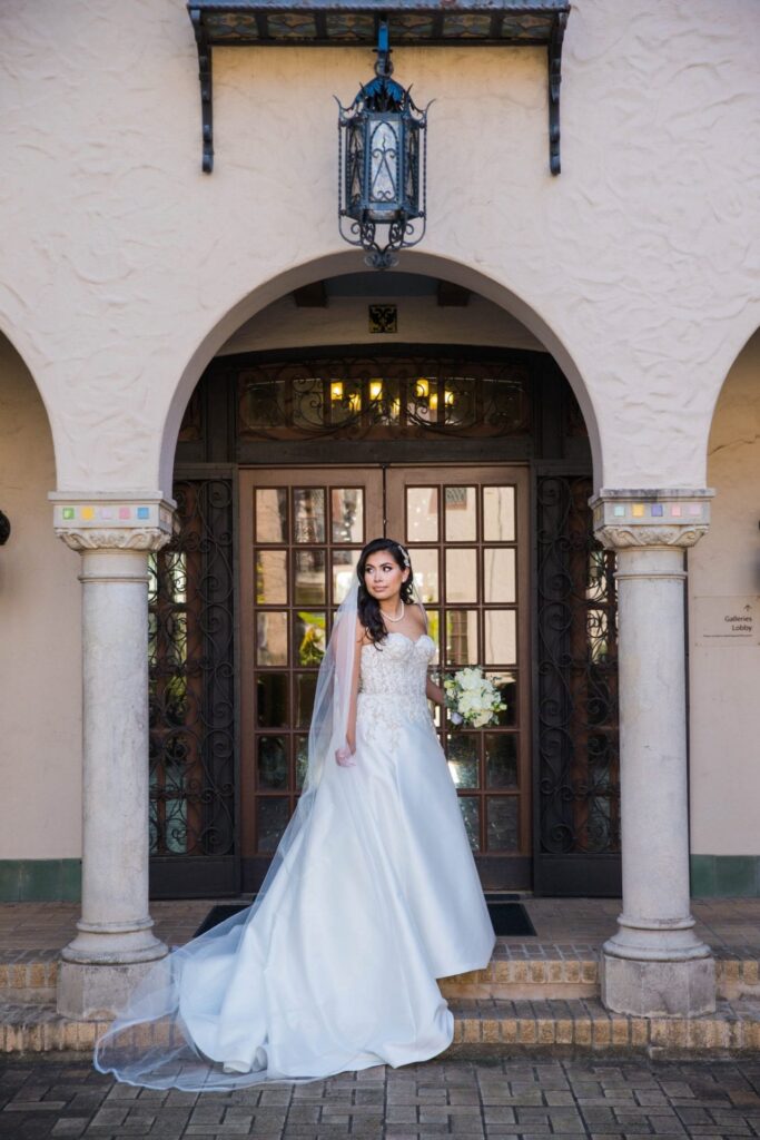 Bridal portrait courtyard arches, Camille at McNay Art Museum