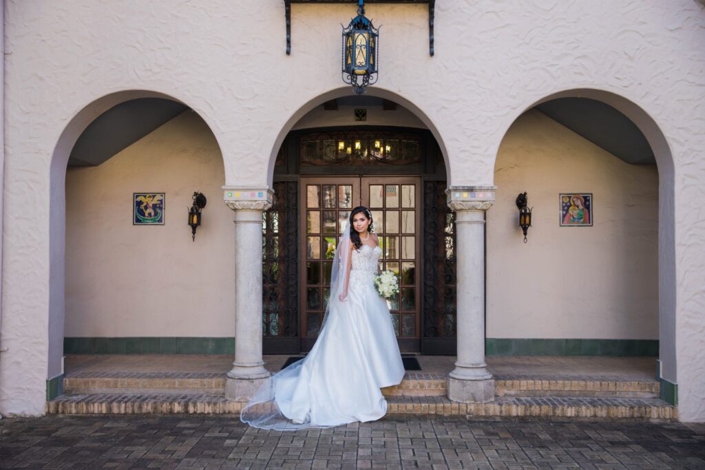 Bridal portrait courtyard arches indoor, Camille at McNay Art Museum
