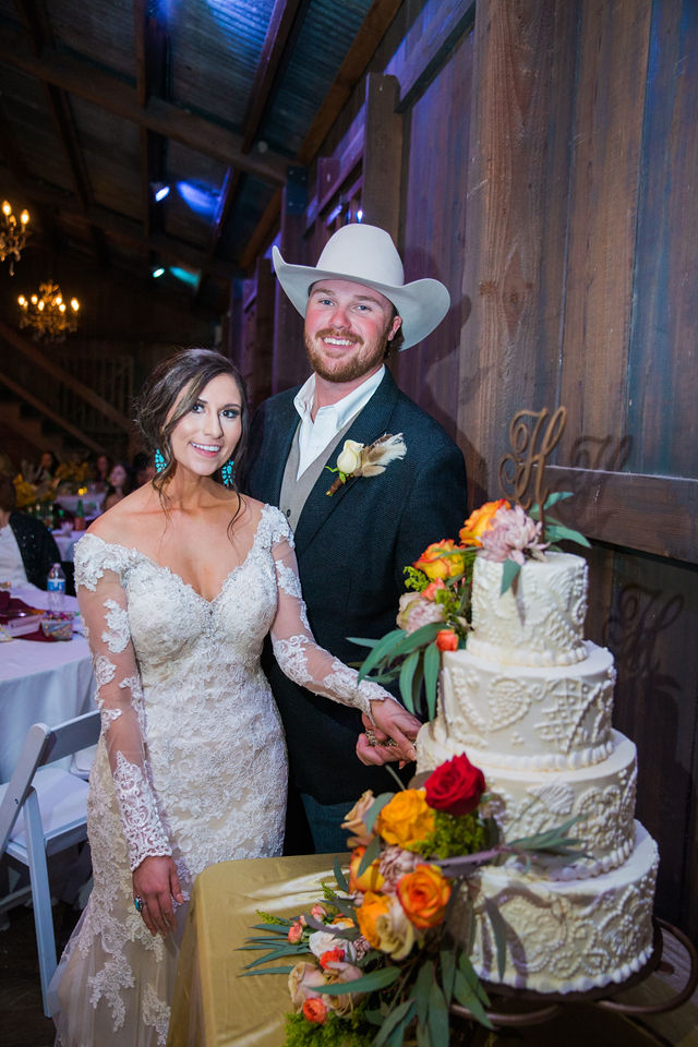 Baleigh's cake cutting Eagle Dancer Ranch Wedding