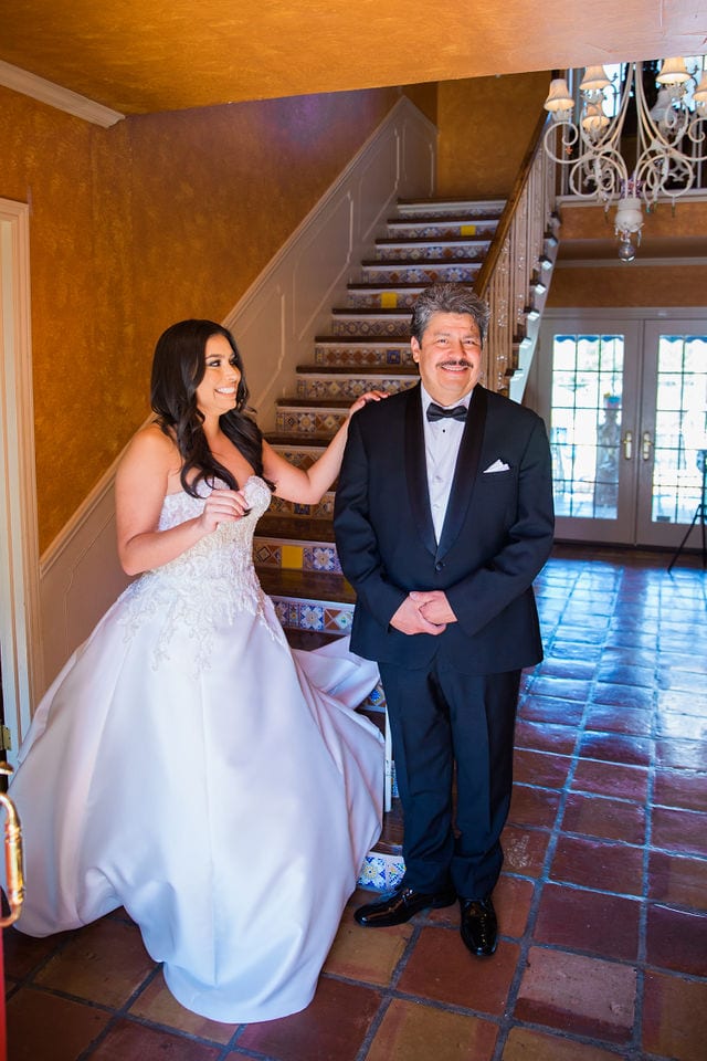 Camille first look with father for wedding at the McNay on the stairs
