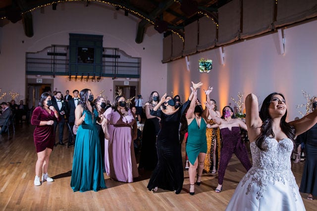 Camille's bouquet toss at the McNay wedding reception