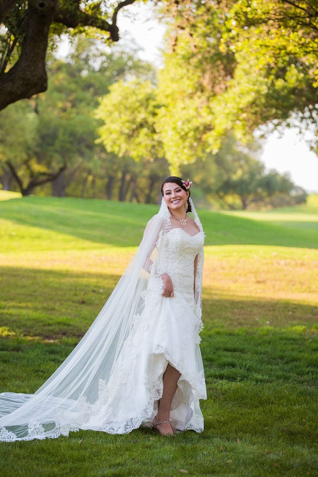 Dominion country club bride on the course with veil