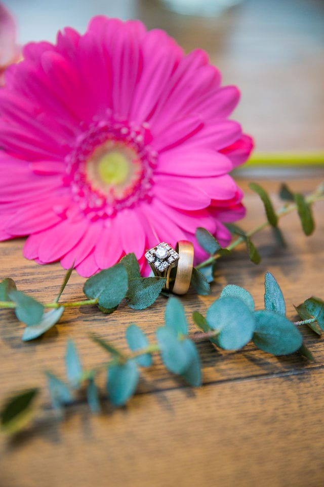 April's San Antonio wedding rings on table