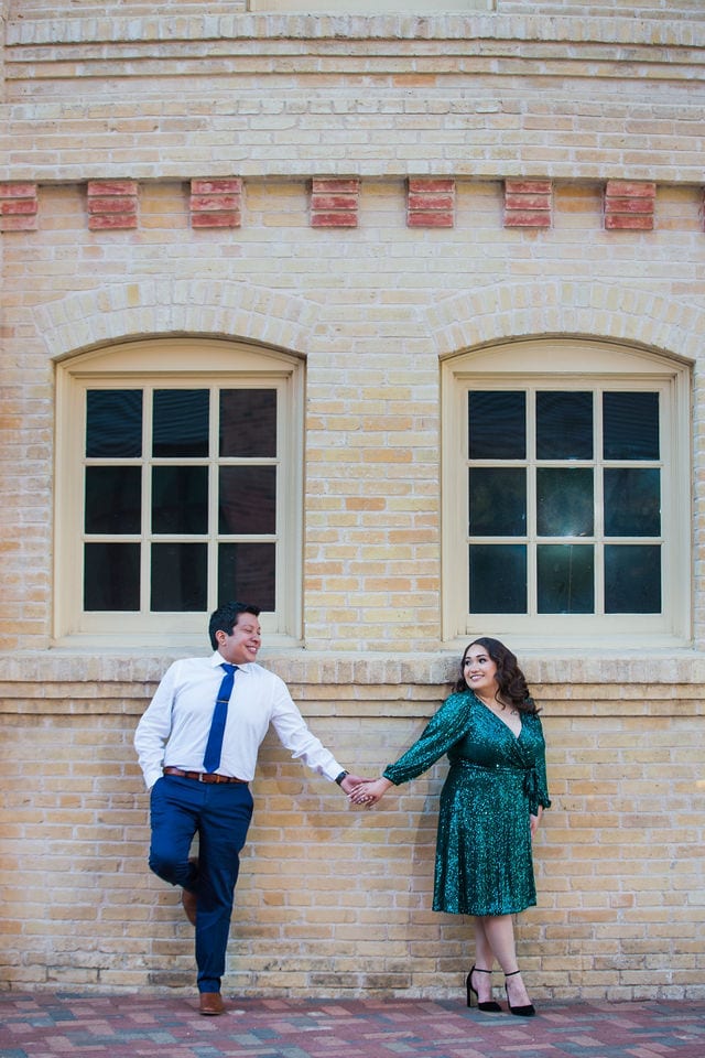 Chloe engagement at the Pearl walking by the Stable