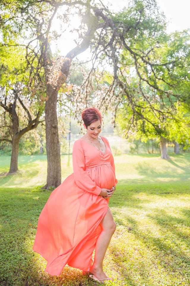 Monique's Maternity session in the grass coral looking down