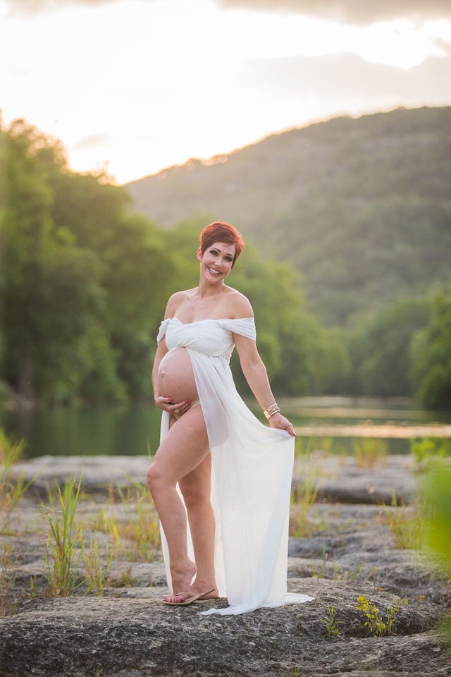Monique's Maternity session in white sunset smiling