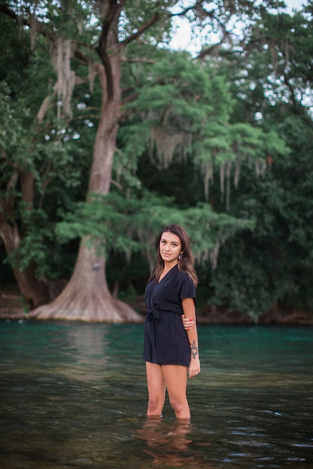 Aubree's Senior session in Gruene standing in the water