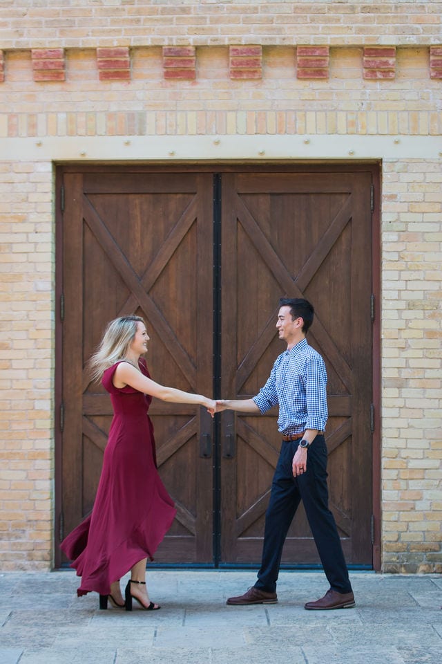 Emily's San Antonio engagement at the Pearl Stable doors dancing