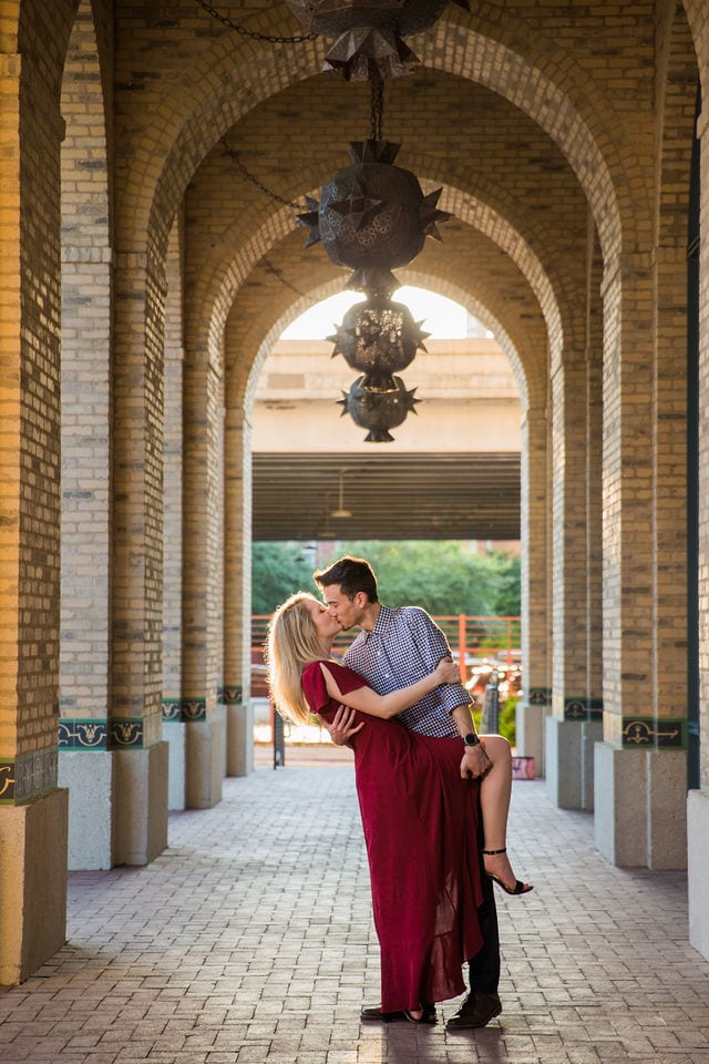 Emily's San Antonio engagement at the Pearl at the bank dip kiss