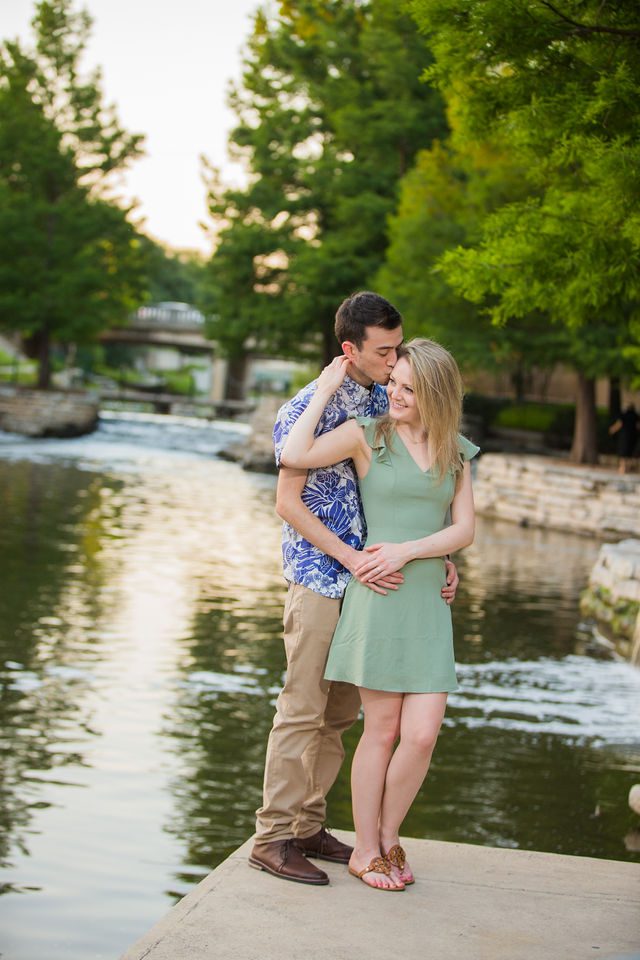 Emily's San Antonio engagement at the Pearl snuggling by the river