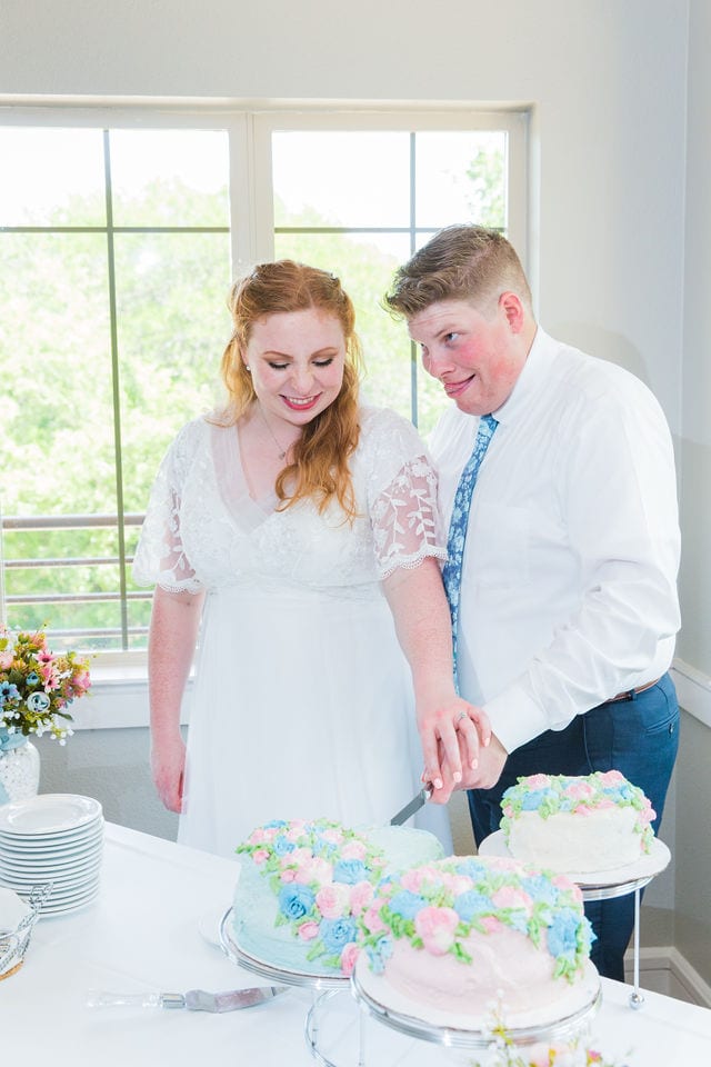 Emma wedding Olympia Hills reception the cake cutting