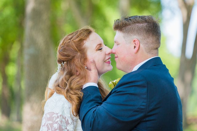 Emma wedding Olympia Hills portrait couple almost kissing