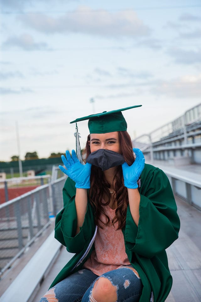 Faith Senior session in Marion cap and gown masks and gloves