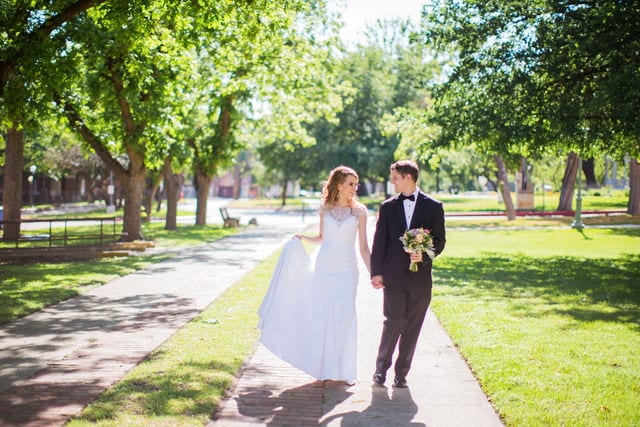 Olivia wedding at University of the Incarnate Word walking in the trees