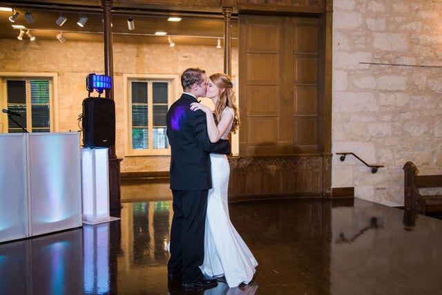 Olivia wedding at southwest school of Art bride reception entrance kiss