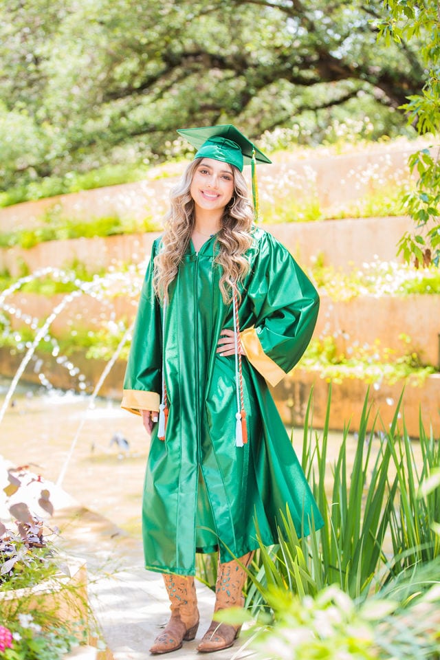 Hailey's senior session at San Antonio Botanical Gardens at fountain cap and gown