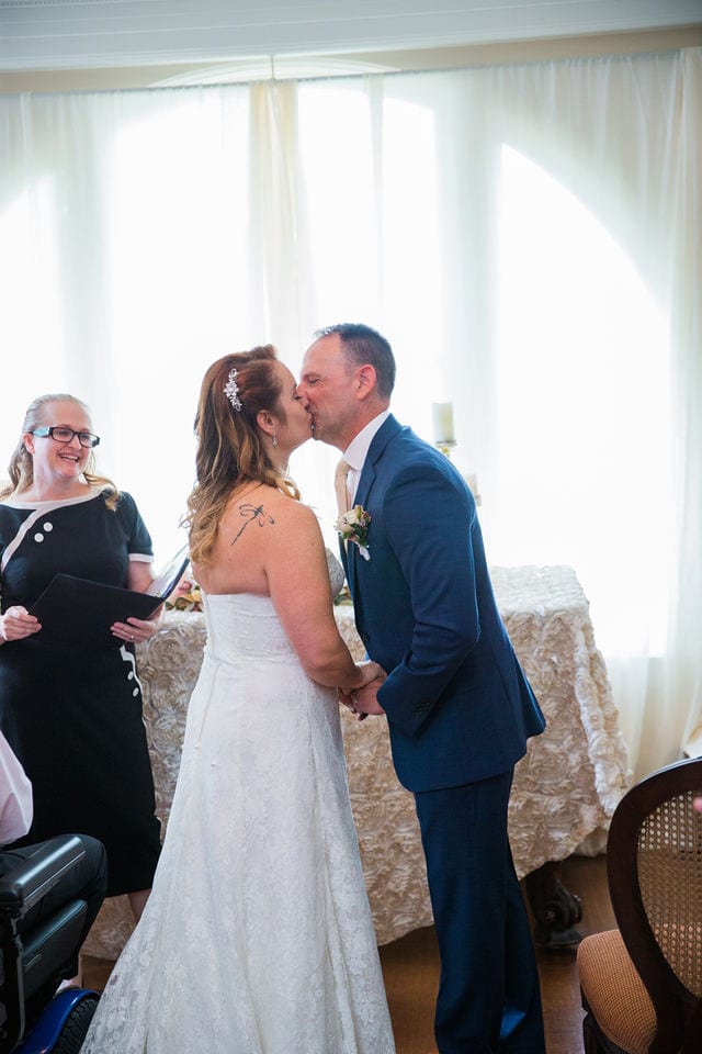 Lara wedding at Lambermont in San Antonio ceremony kiss