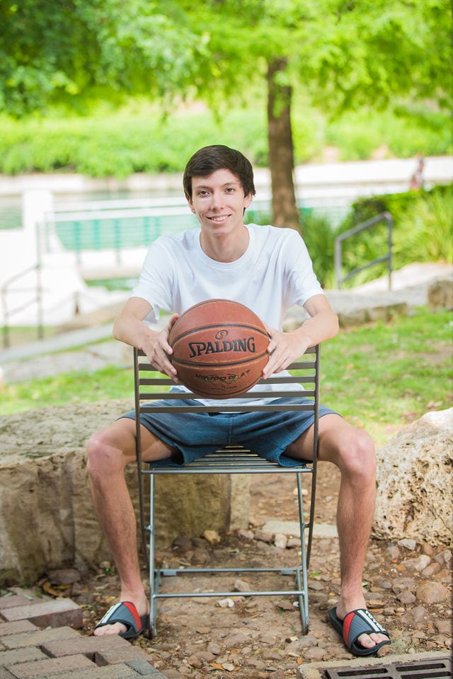 Wyatt's senior session the Pearl with basketball sitting