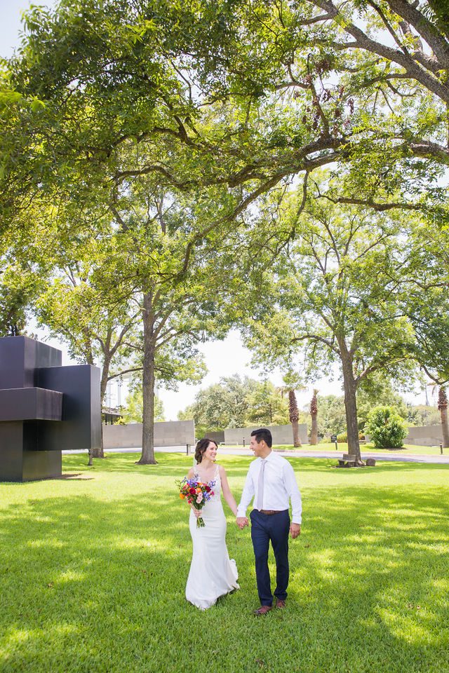 Anne wedding at the McNay the couple in the trees walking portrait