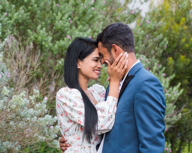 Rishi and Sahis San Antonio proposal couple portrait her touching his face