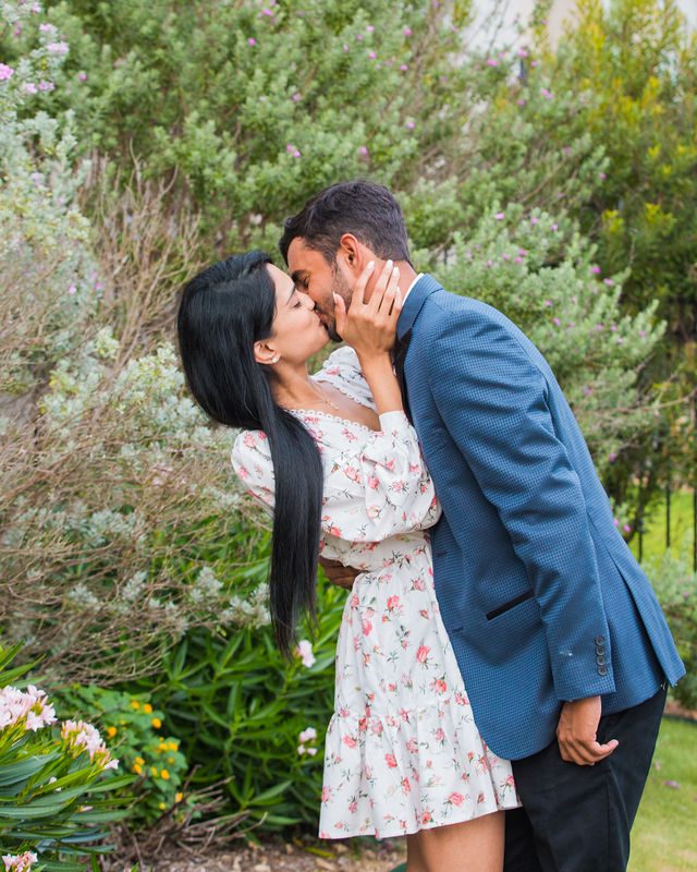 Rishi and Sahis San Antonio proposal couple portrait her kissing him dipping