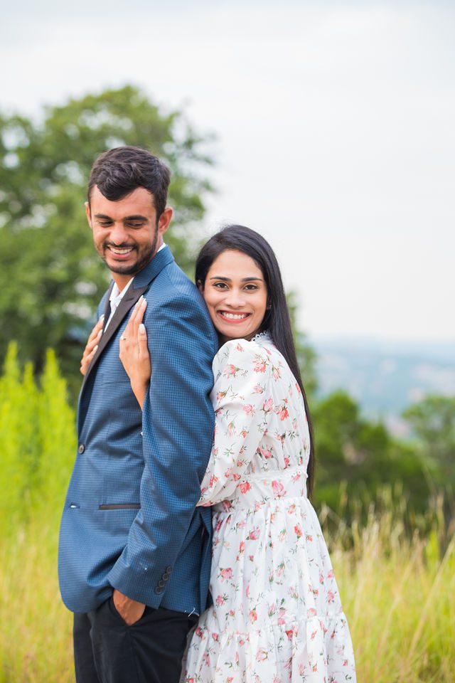 Rishi and Sahis San Antonio proposal on top of the hill back hug