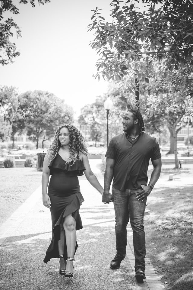 Dominic's engagement session at St Anthony at Travis Park walking