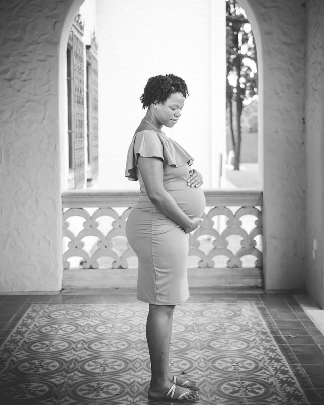 Shara maternity McNay Art Museum by the column black and white