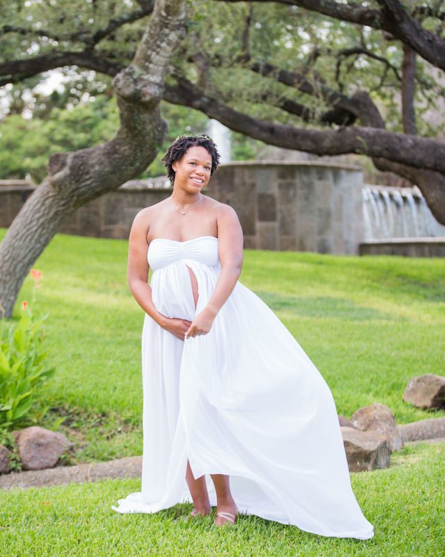 Shara maternity McNay Art Museum white gown blowing under the fountain