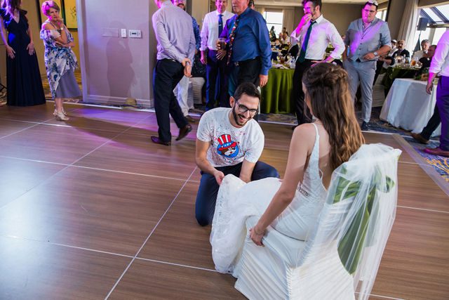 Ophir's San Antonio wedding reception getting the garter