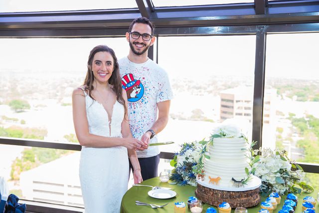 Ophir's San Antonio wedding reception the cake cutting portrait